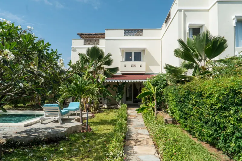 The garden path beside the villa